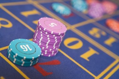 Live casino studio with multiple dealer tables